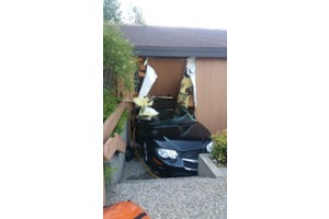 Vehicle into Holiday Market