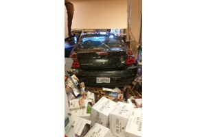 Vehicle into Holiday Market